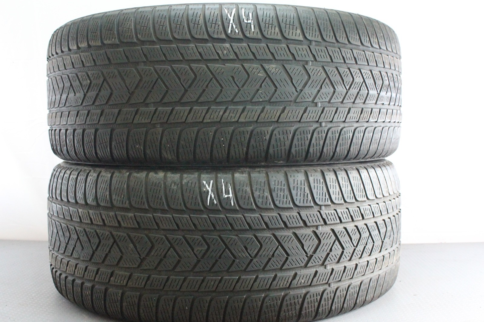 358474934372-featured 2x 285/45 R21 113V Winterreifen Pirelli ScorpionWinter* RSC Dot2022 4-5mm X4 – Bild 1